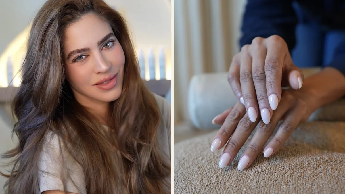 Nail technician shaping a precise Russian manicure.
